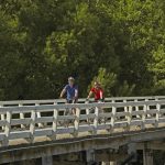 thumb_bikers crossing a bridge in southland nz