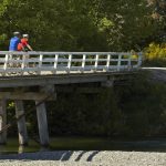 thumb_biker crossing a bridge in queenstown nz