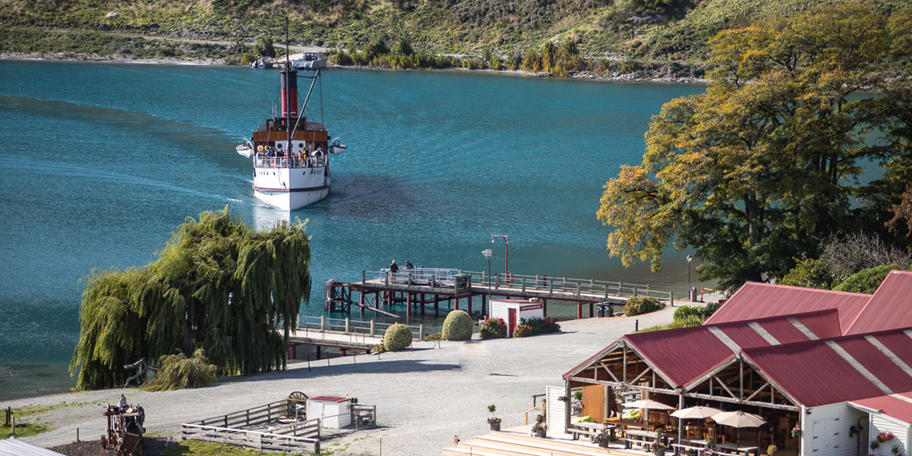 Real NZ TSS Earnslaw pulling in to Walter Peak