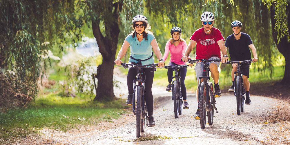 family biking in queenstown